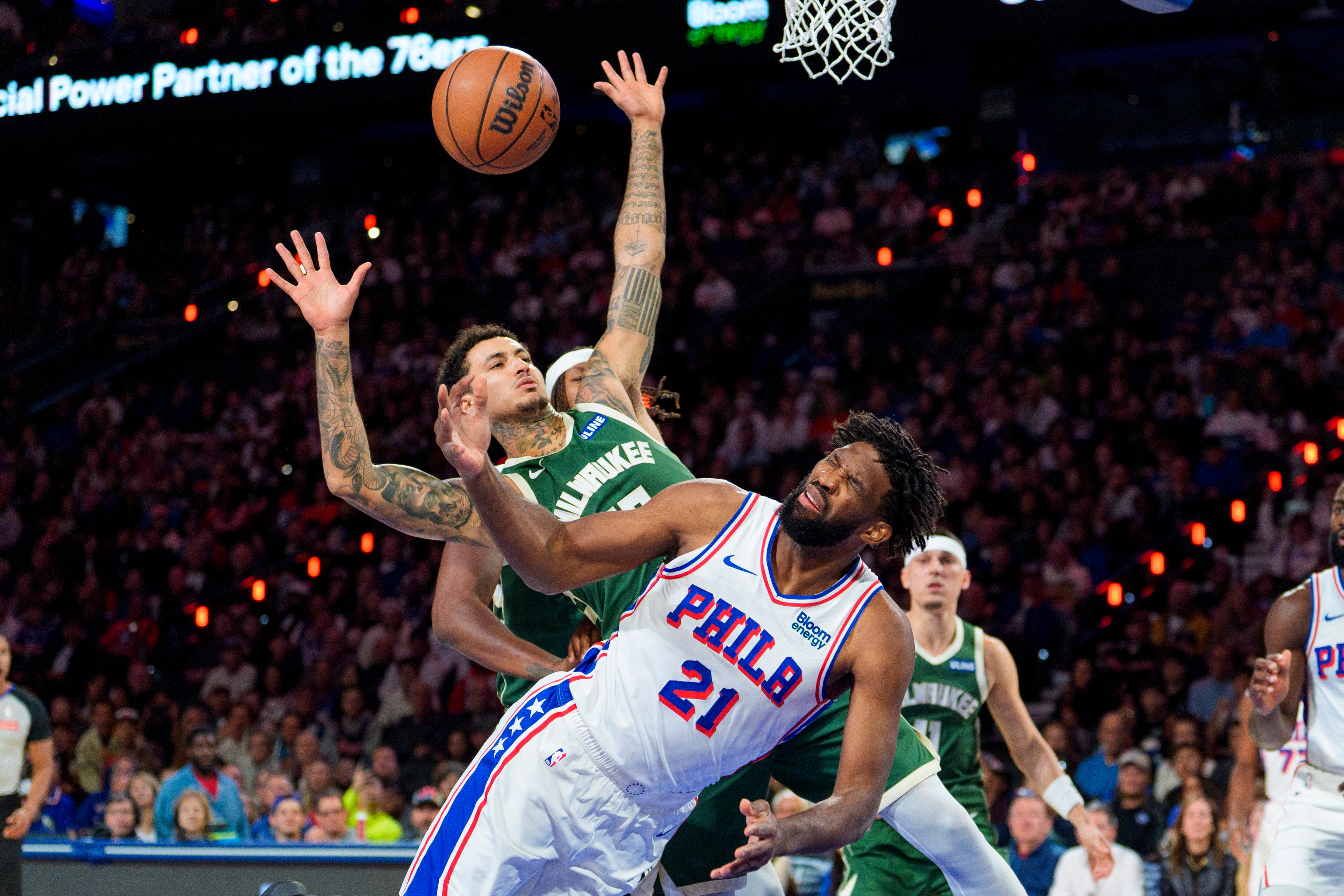 Embiid posts triple-double to keep 76ers perfect in win over Bucks